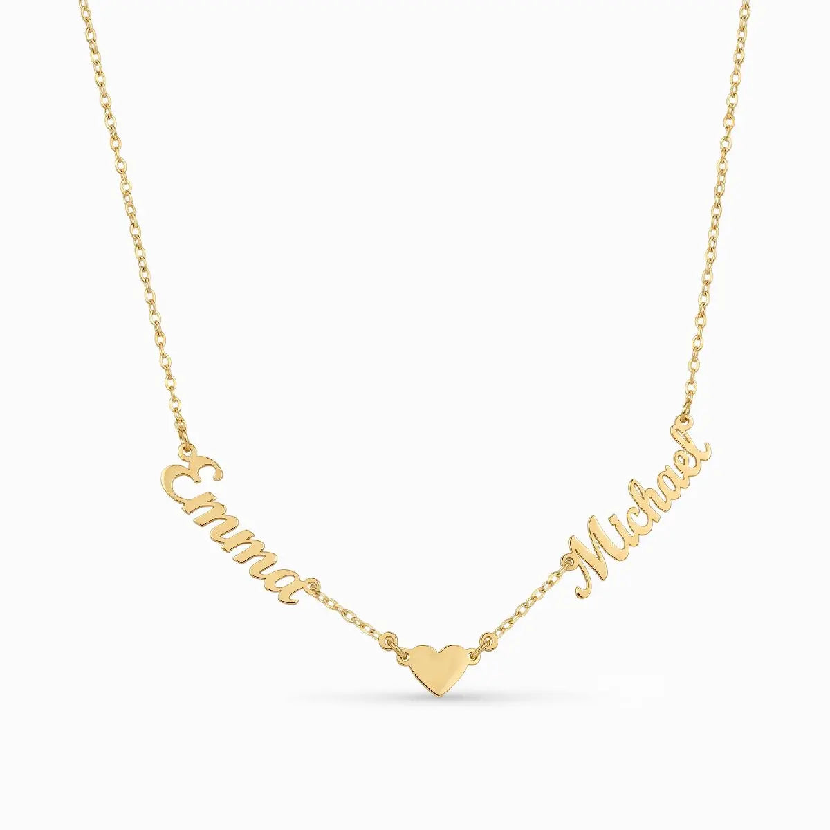 Custom gold two name necklace featuring cursive names Emma and Michael joined by a smooth polished heart in the center
