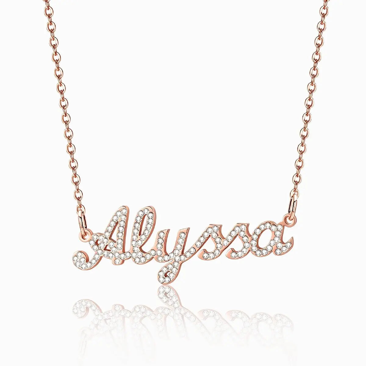 Custom rose gold diamond nameplate necklace featuring cursive script name Alyssa fully paved with sparkling CZ crystals