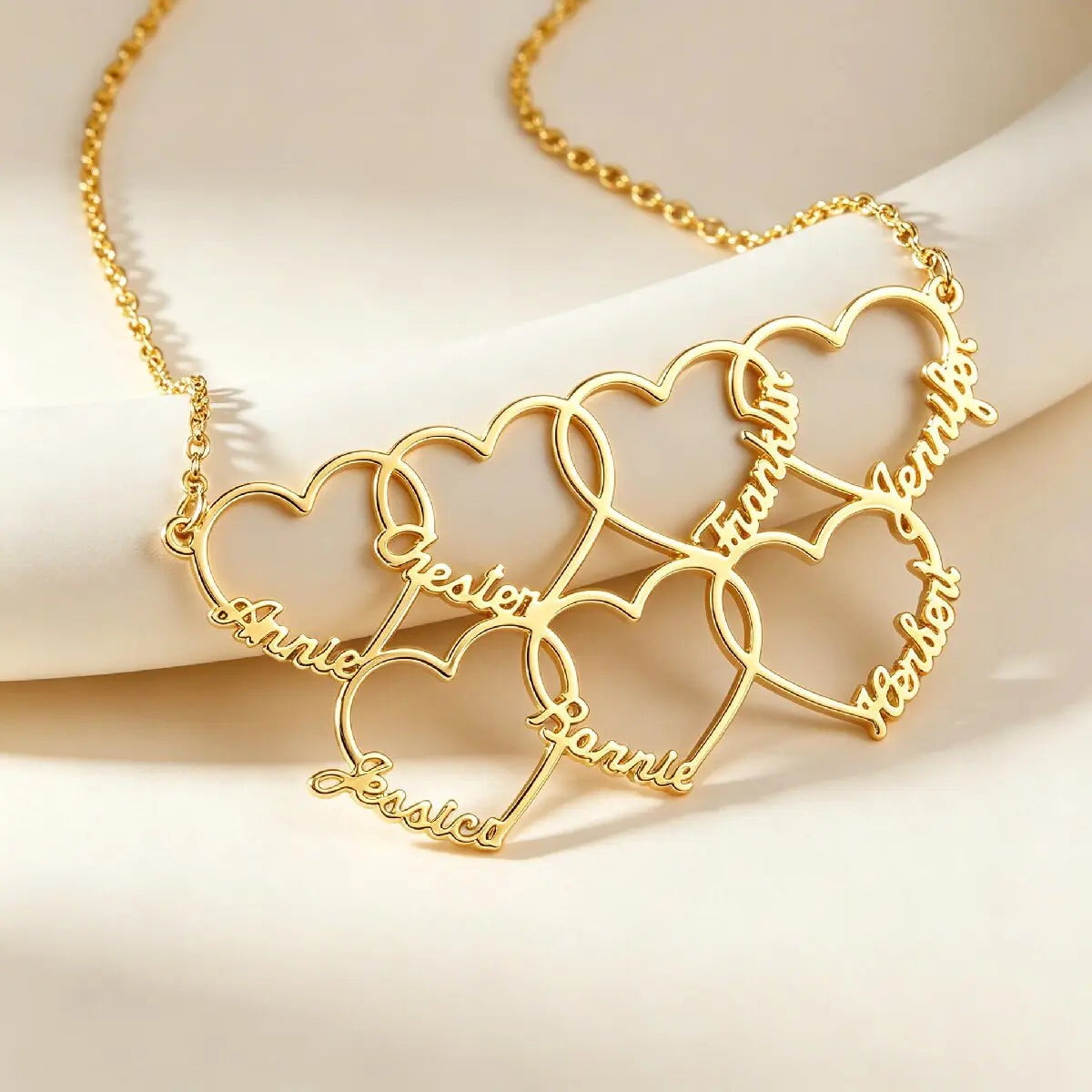 Sentimental gold personalized multi-heart kids name necklace as a sweet Mother's Day gift for mom and grandma